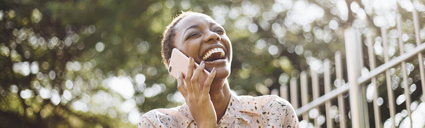 Woman Laughing on Phone